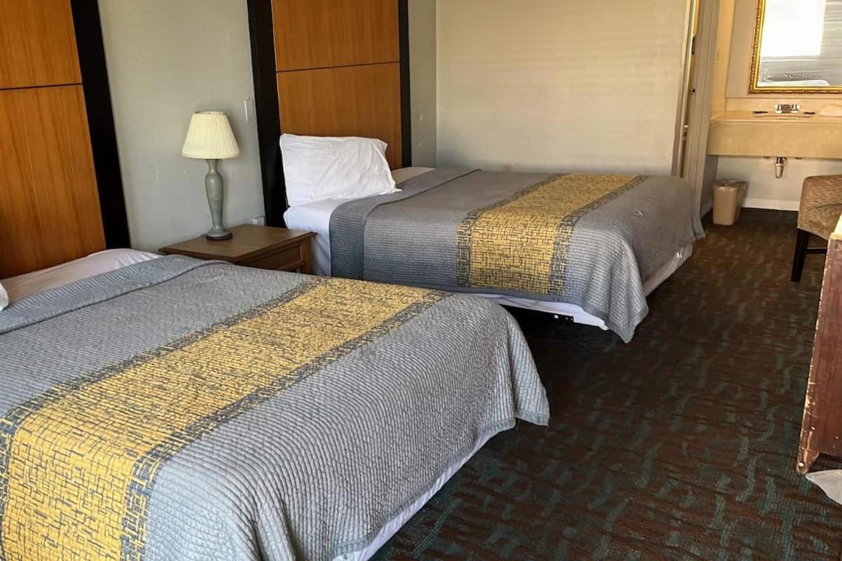 APM Inn & Suite - Housity