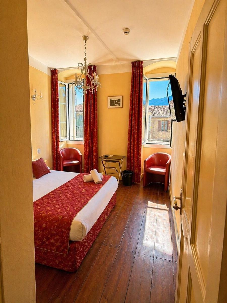 Un ou plusieurs lits dans un hébergement de l'établissement Hôtel U Palazzu & Spa