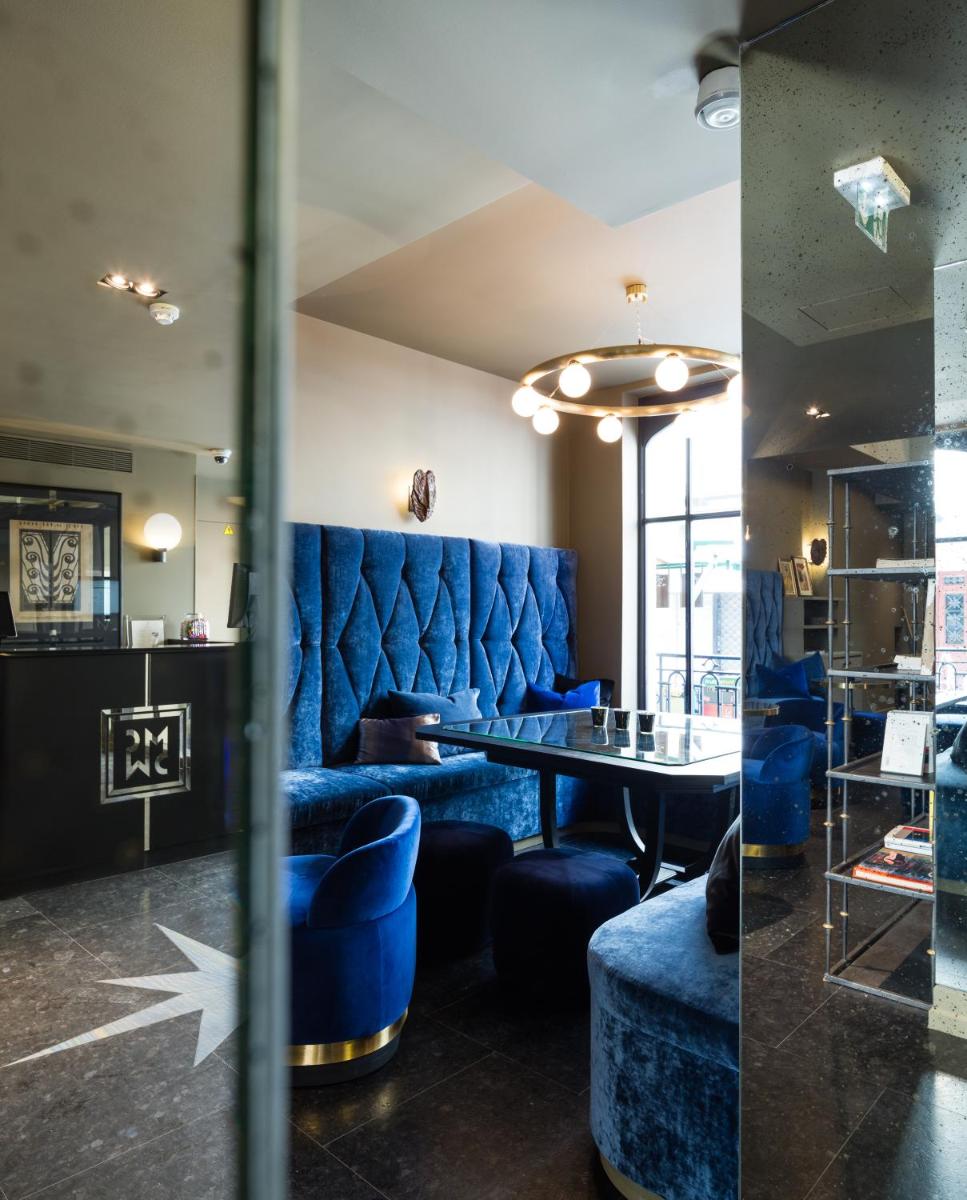 Coin salon dans l'établissement Monsieur Cadet Hotel & Spa