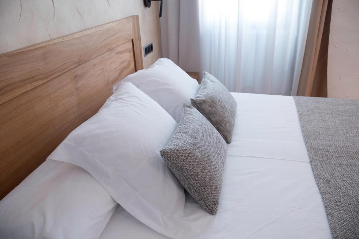 Cama o camas de una habitación en Sa Voga Hotel & Spa