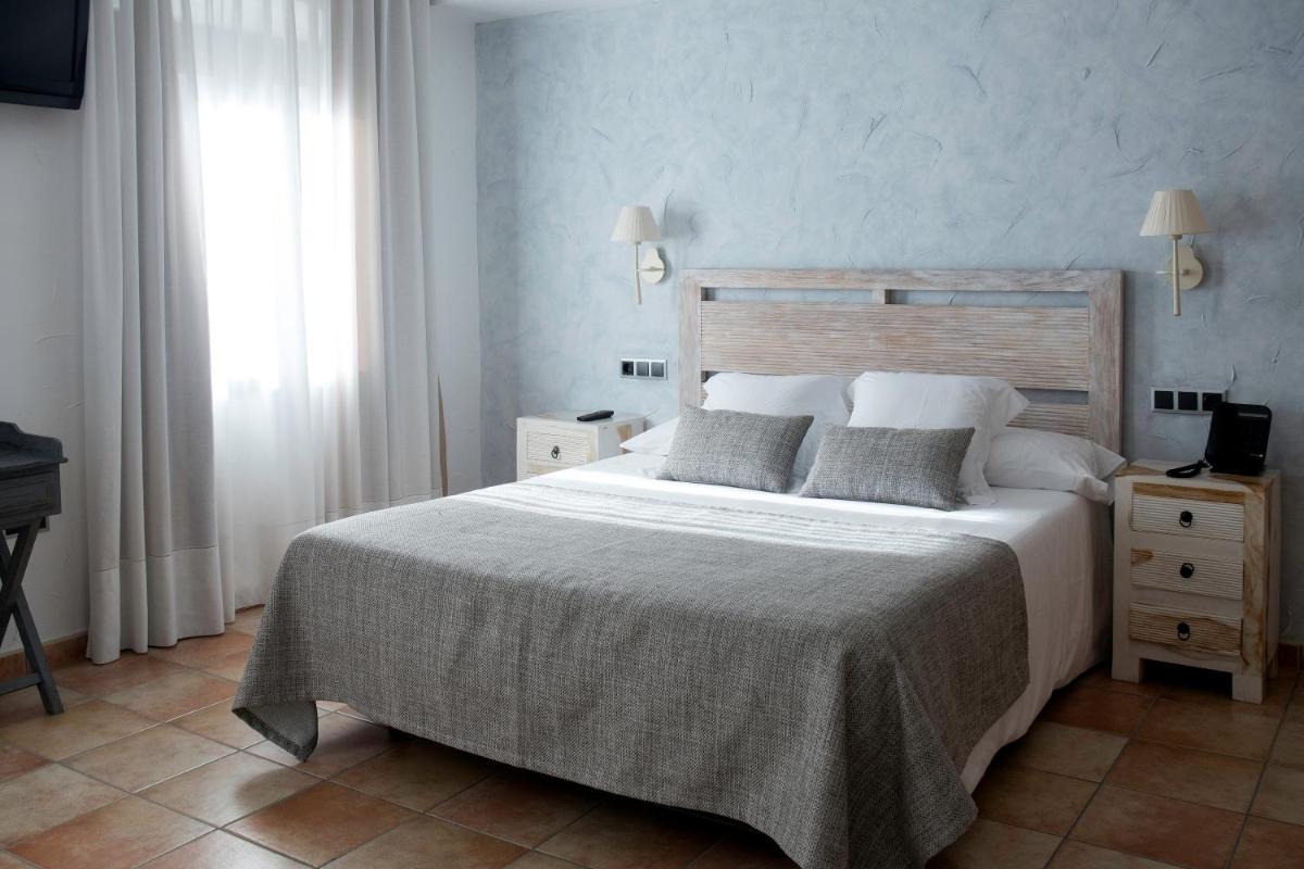 Cama o camas de una habitación en Sa Voga Hotel & Spa