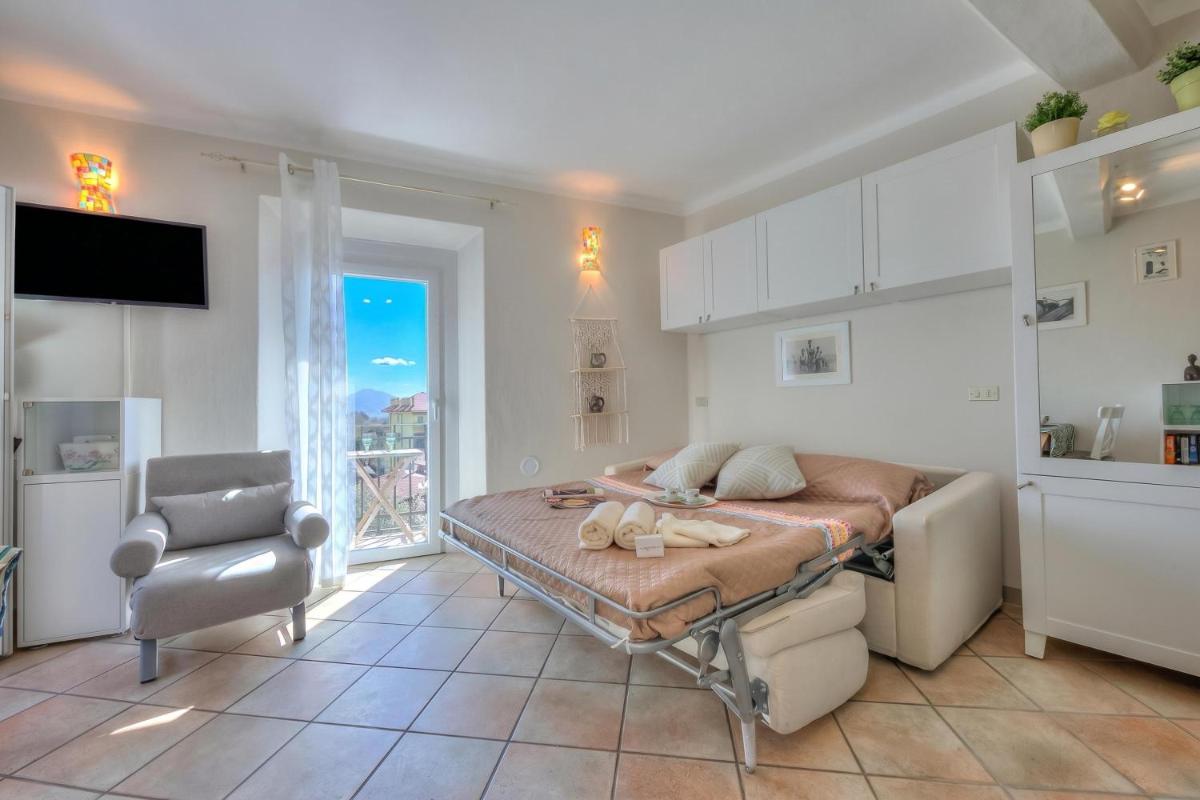 Nido Belvedere Lake View - Happy Rentals - Housity