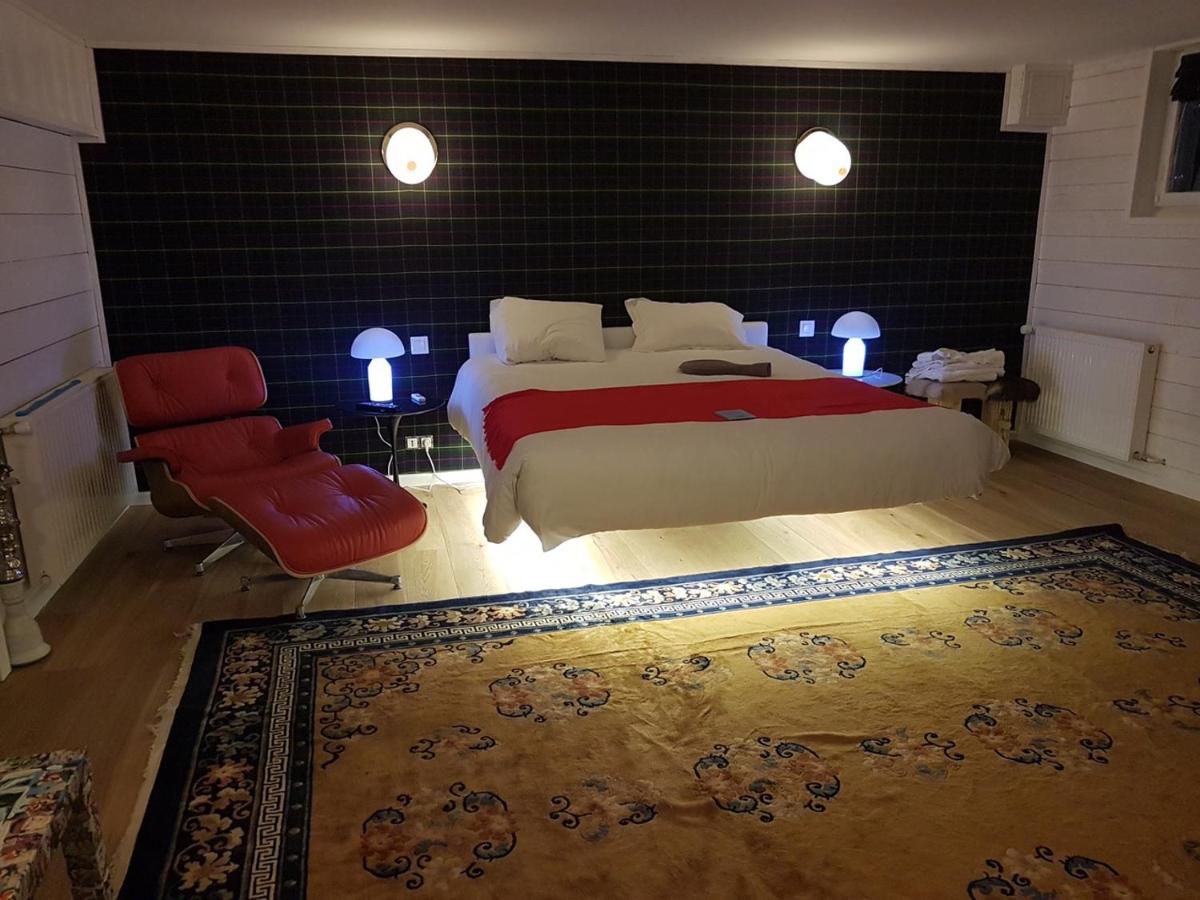 Un ou plusieurs lits dans un hébergement de l'établissement Snow Lodge Hotel Courchevel 1850