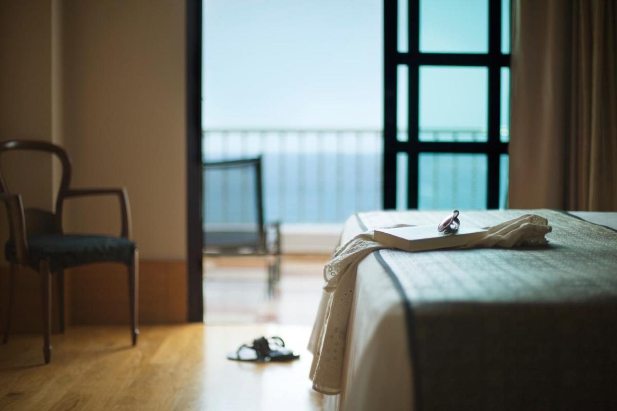 Cama o camas de una habitación en Adrián Hoteles Jardines de Nivaria