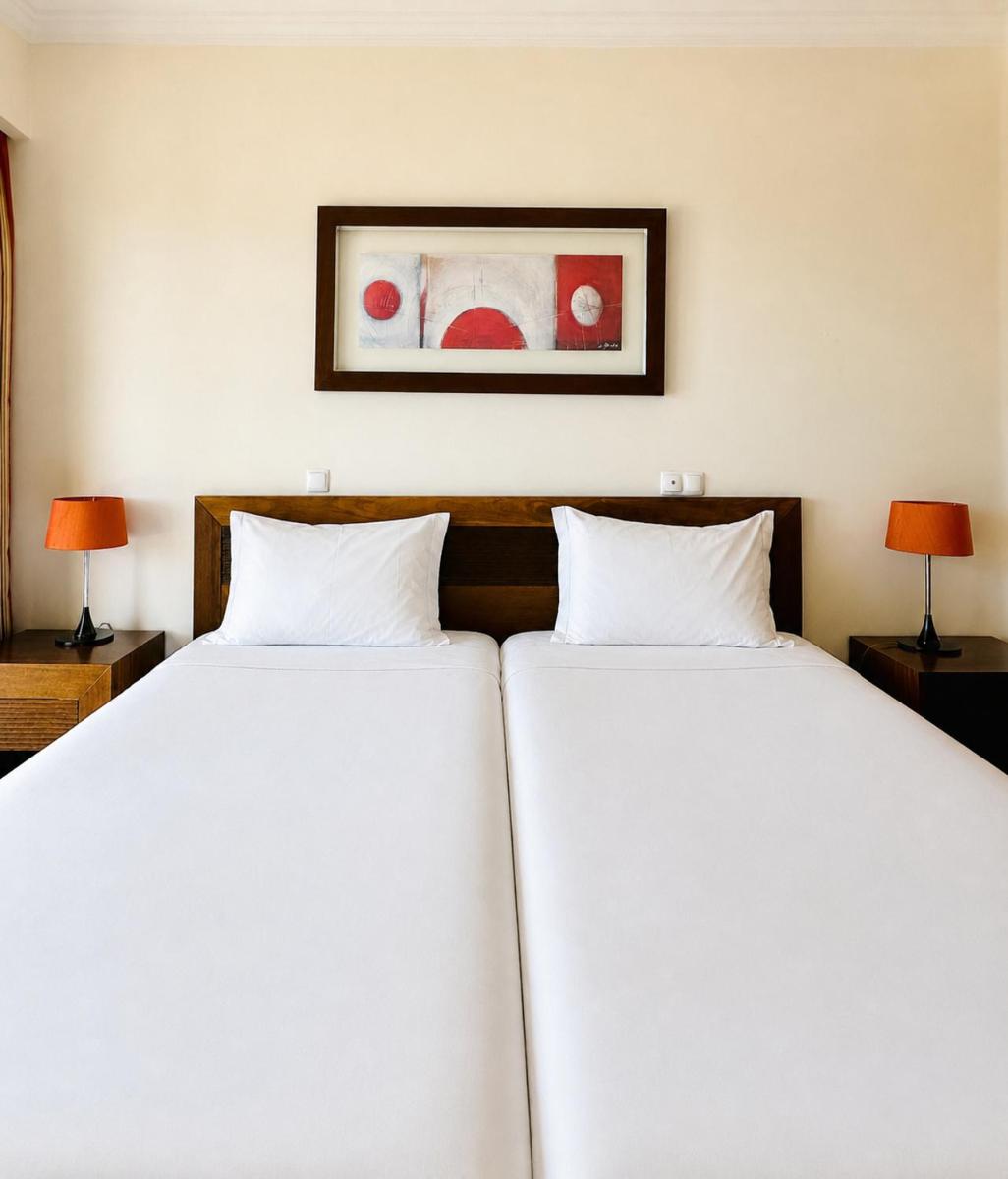 Uma cama ou camas num quarto em Cerro Mar Atlantico & Cerro Mar Garden