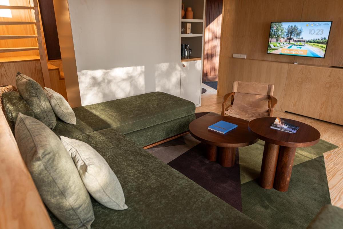 Uma televisão e/ou sistema de entretenimento em Torre de Gomariz Wine & Spa Hotel