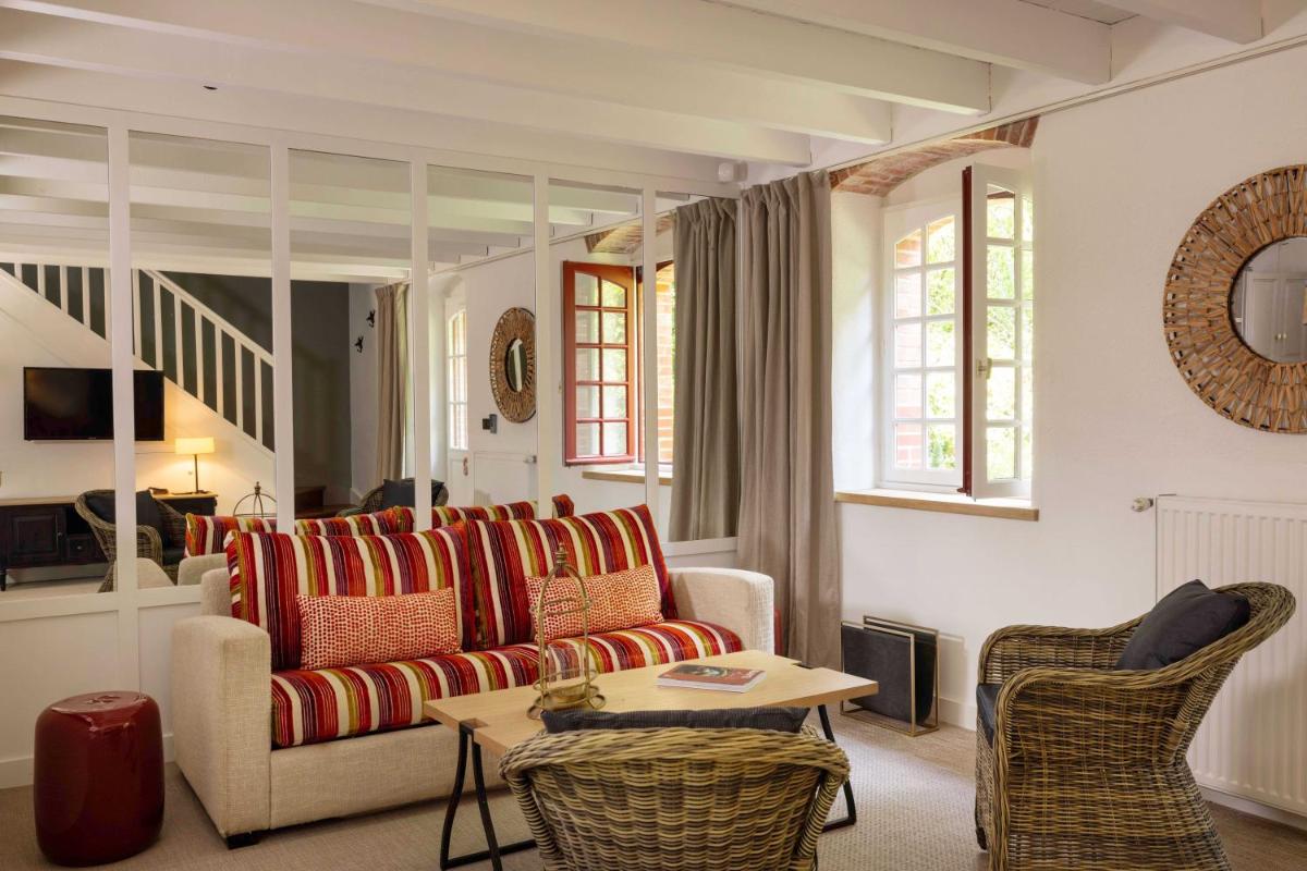 Coin salon dans l'établissement Hôtel & Spa de La Bretesche