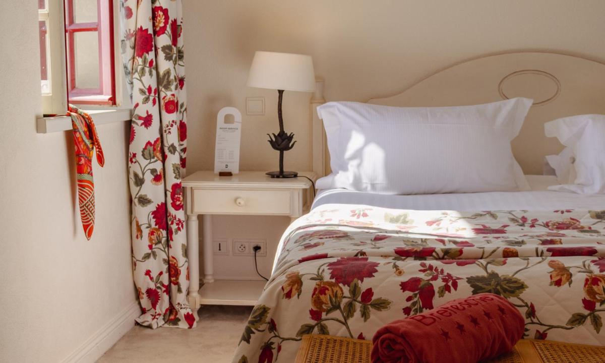 Un ou plusieurs lits dans un hébergement de l'établissement Hôtel & Spa de La Bretesche