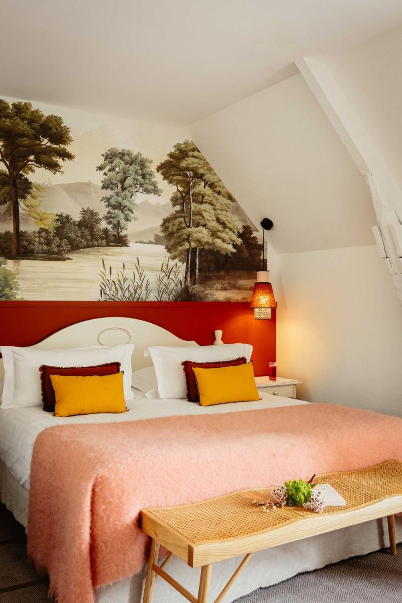 Un ou plusieurs lits dans un hébergement de l'établissement Hôtel & Spa de La Bretesche