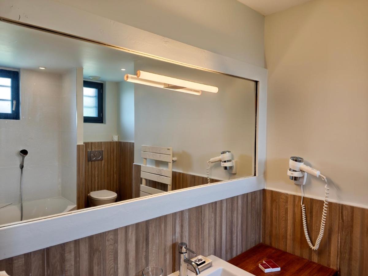 Salle de bains dans l'établissement Domaine De La Corniche