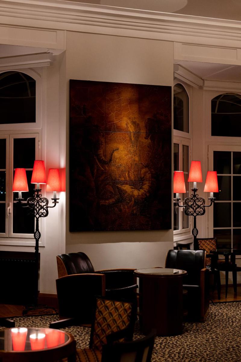 Coin salon dans l'établissement Hôtel Belles Rives