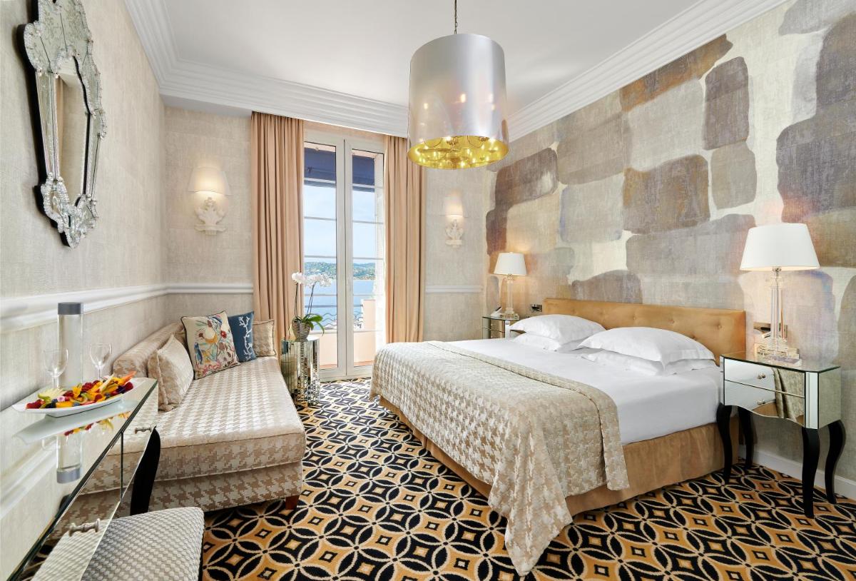 Un ou plusieurs lits dans un hébergement de l'établissement Hôtel Belles Rives