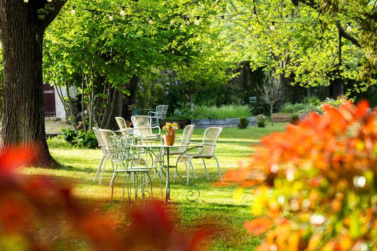 Jardin de l'établissement Hôtel - Restaurant & Spa La Magdeleine - Mathias Dandine