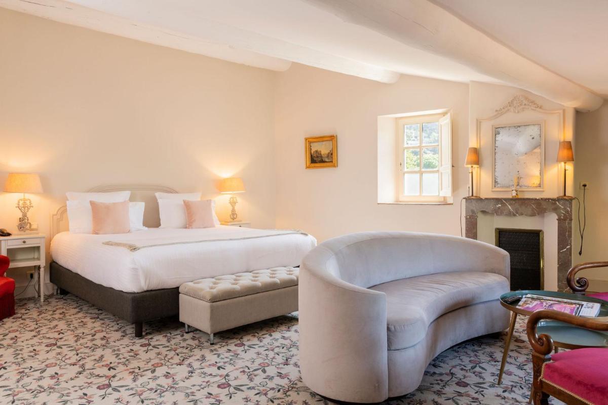 Un ou plusieurs lits dans un hébergement de l'établissement Hôtel - Restaurant & Spa La Magdeleine - Mathias Dandine