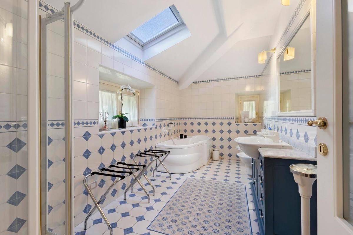 L'americano Luxury Rooms - Housity