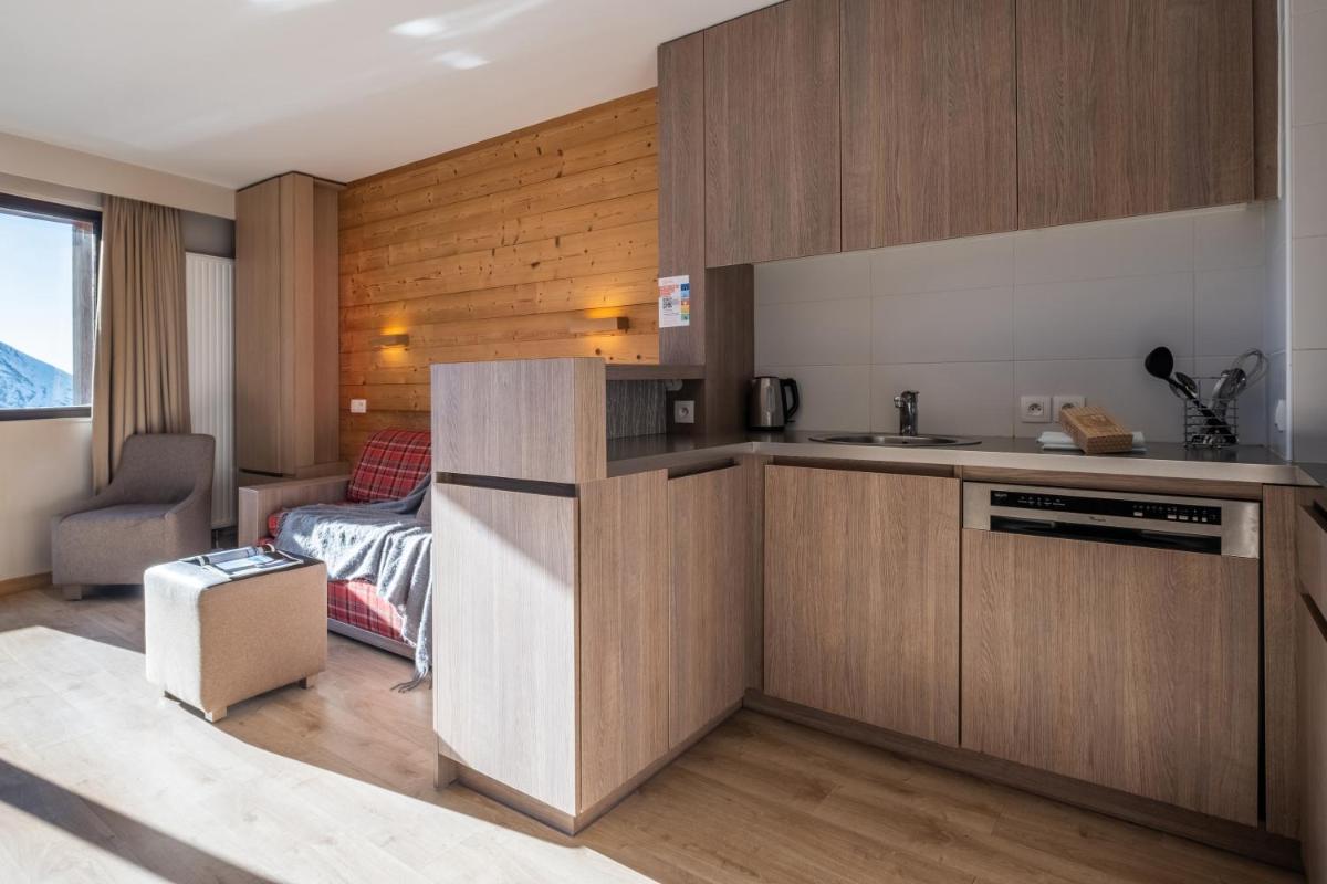 Cuisine ou kitchenette dans l'établissement Résidence Pierre & Vacances Atria-Crozats