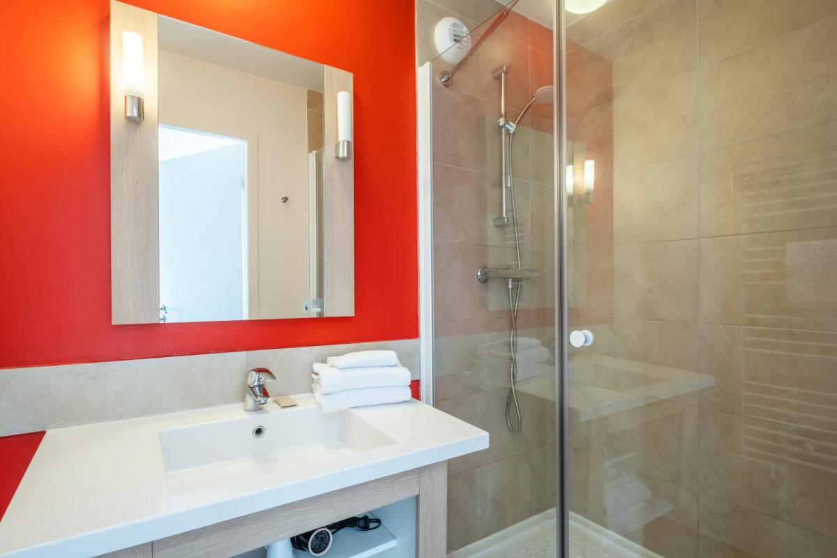 Salle de bains dans l'établissement Résidence Pierre & Vacances Atria-Crozats