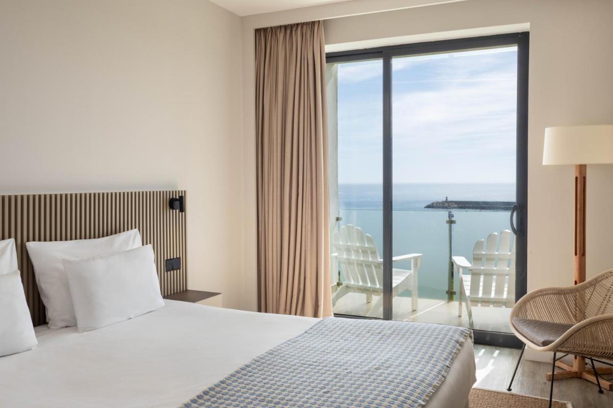 Uma cama ou camas num quarto em Memmo Baleeira - Design Hotels