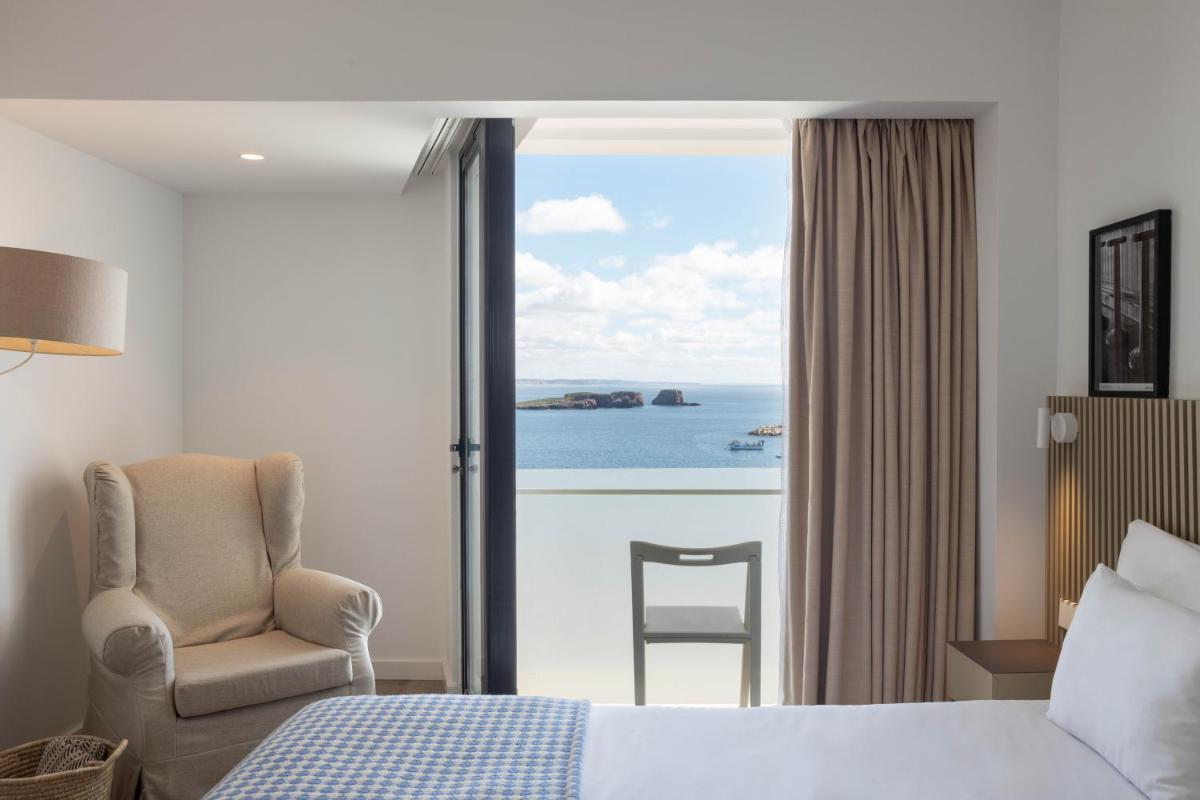 Uma cama ou camas num quarto em Memmo Baleeira - Design Hotels