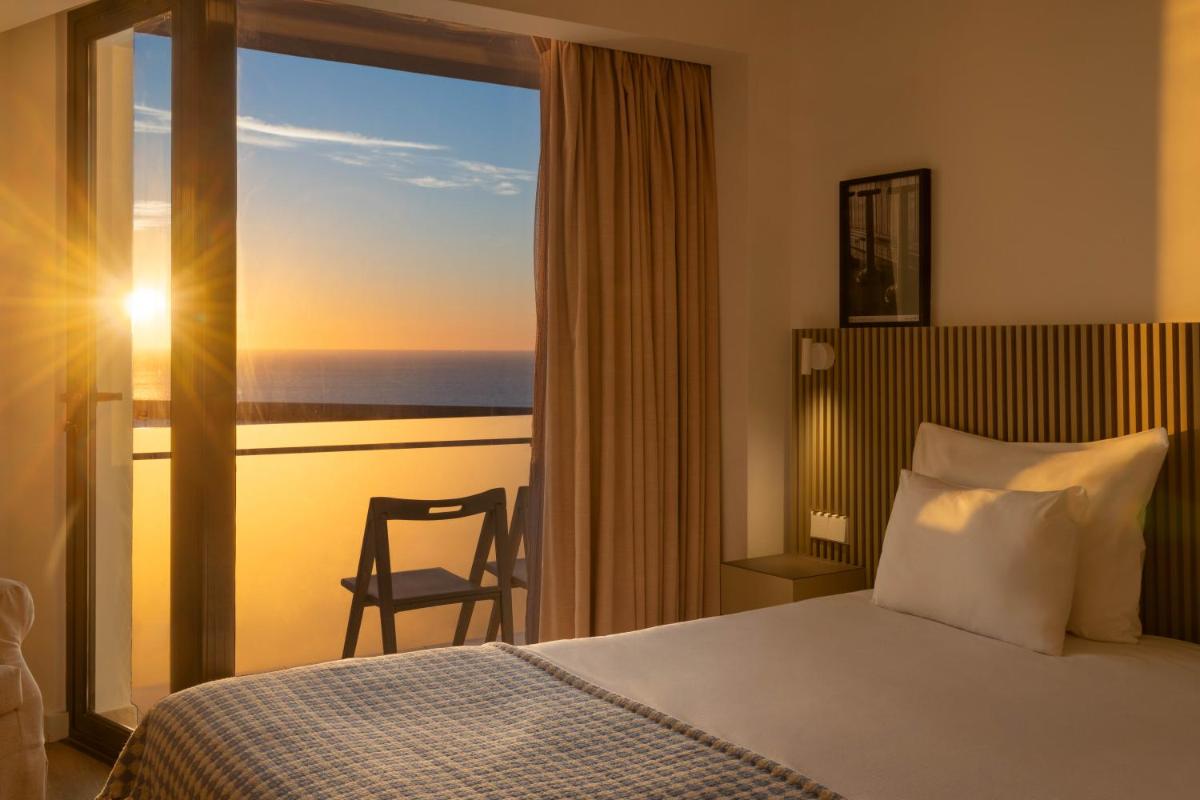 Uma cama ou camas num quarto em Memmo Baleeira - Design Hotels