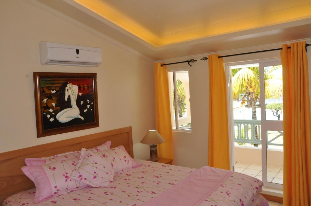 Villas Right ON the Beach Belle Mare - Housity