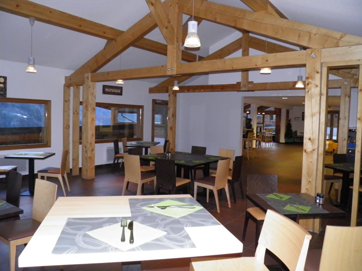 Restaurant ou autre lieu de restauration dans l'établissement Résidence Orelle 3 vallées by AltiResid