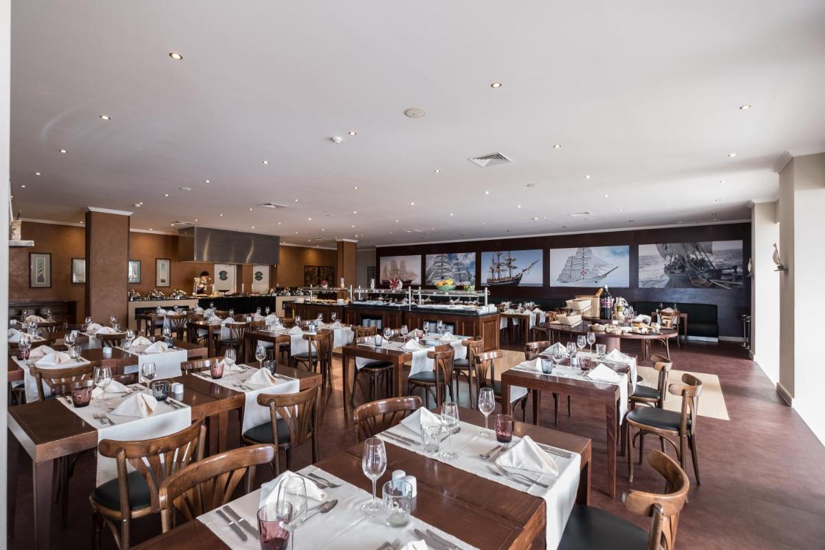 Um restaurante ou outro lugar para comer em Vila Gale Ericeira