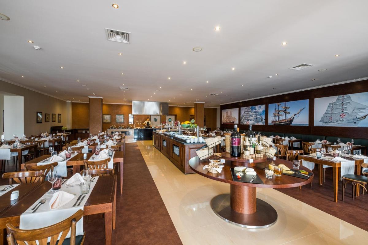 Um restaurante ou outro lugar para comer em Vila Gale Ericeira