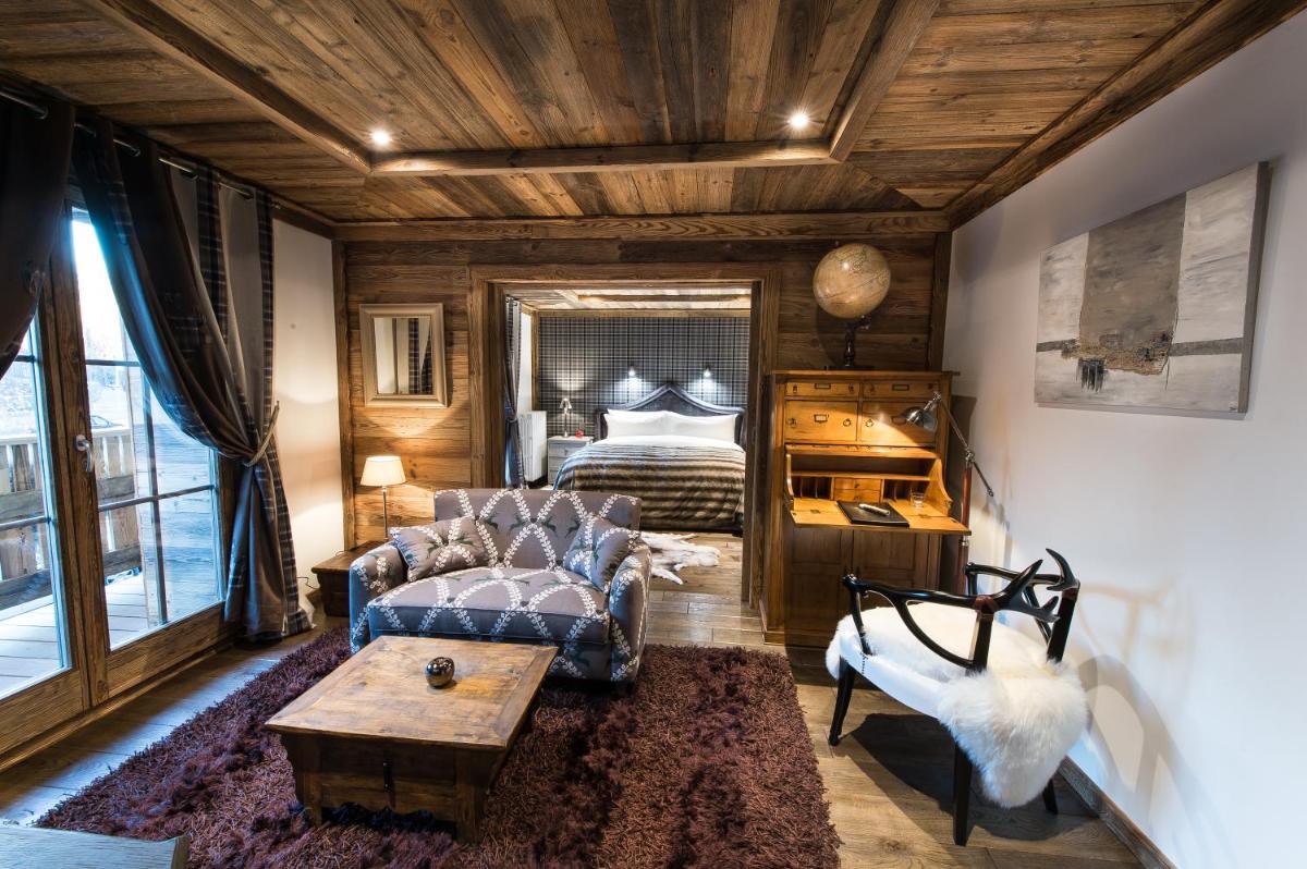 Un ou plusieurs lits dans un hébergement de l'établissement Le Chalet Blanc