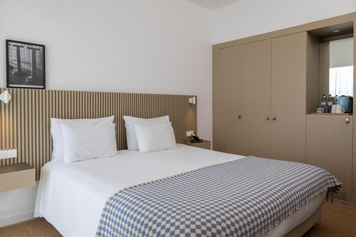 Uma cama ou camas num quarto em Memmo Baleeira - Design Hotels