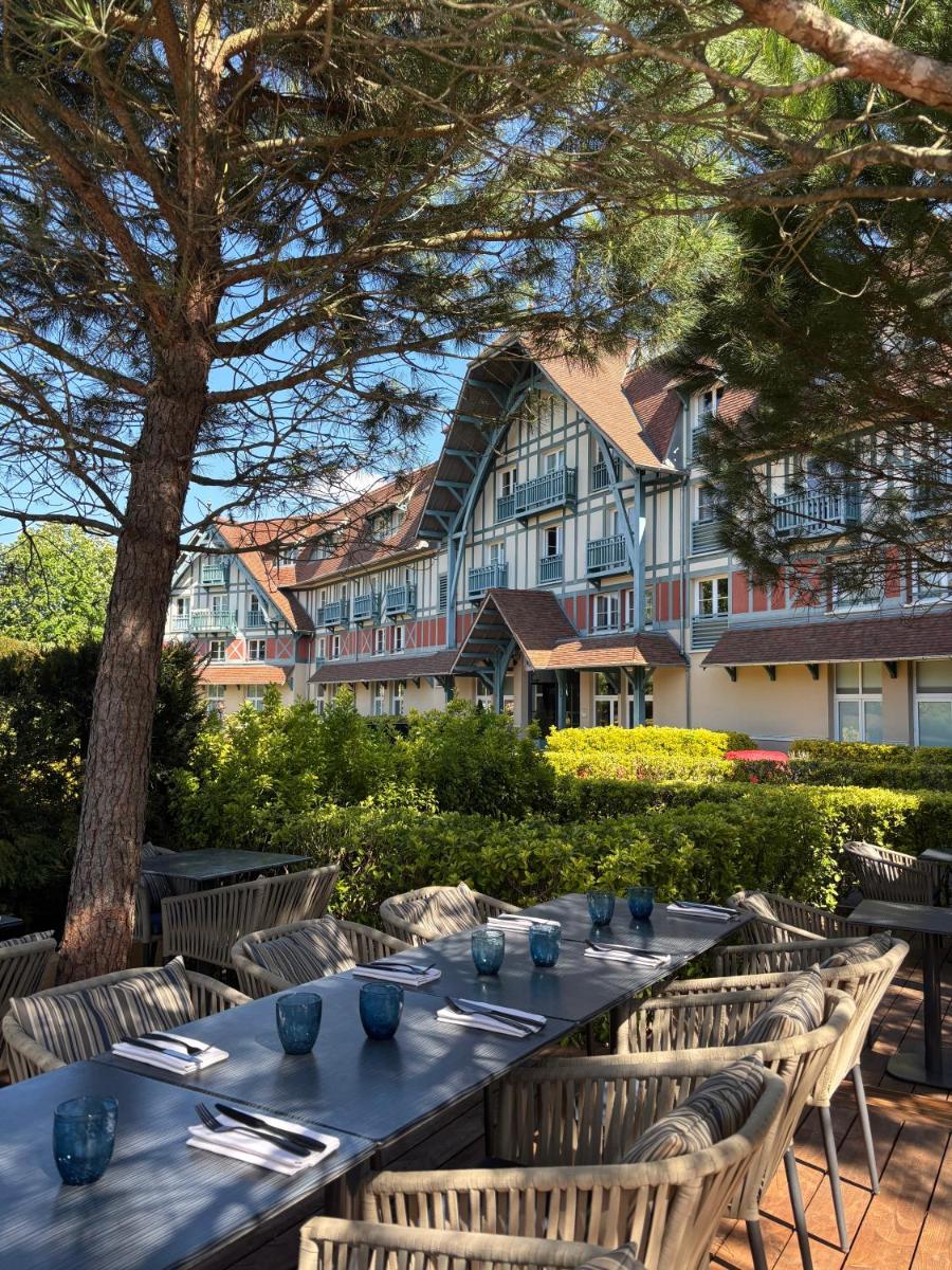 Restaurant ou autre lieu de restauration dans l'établissement Renaissance Paris Hippodrome de St. Cloud Hotel