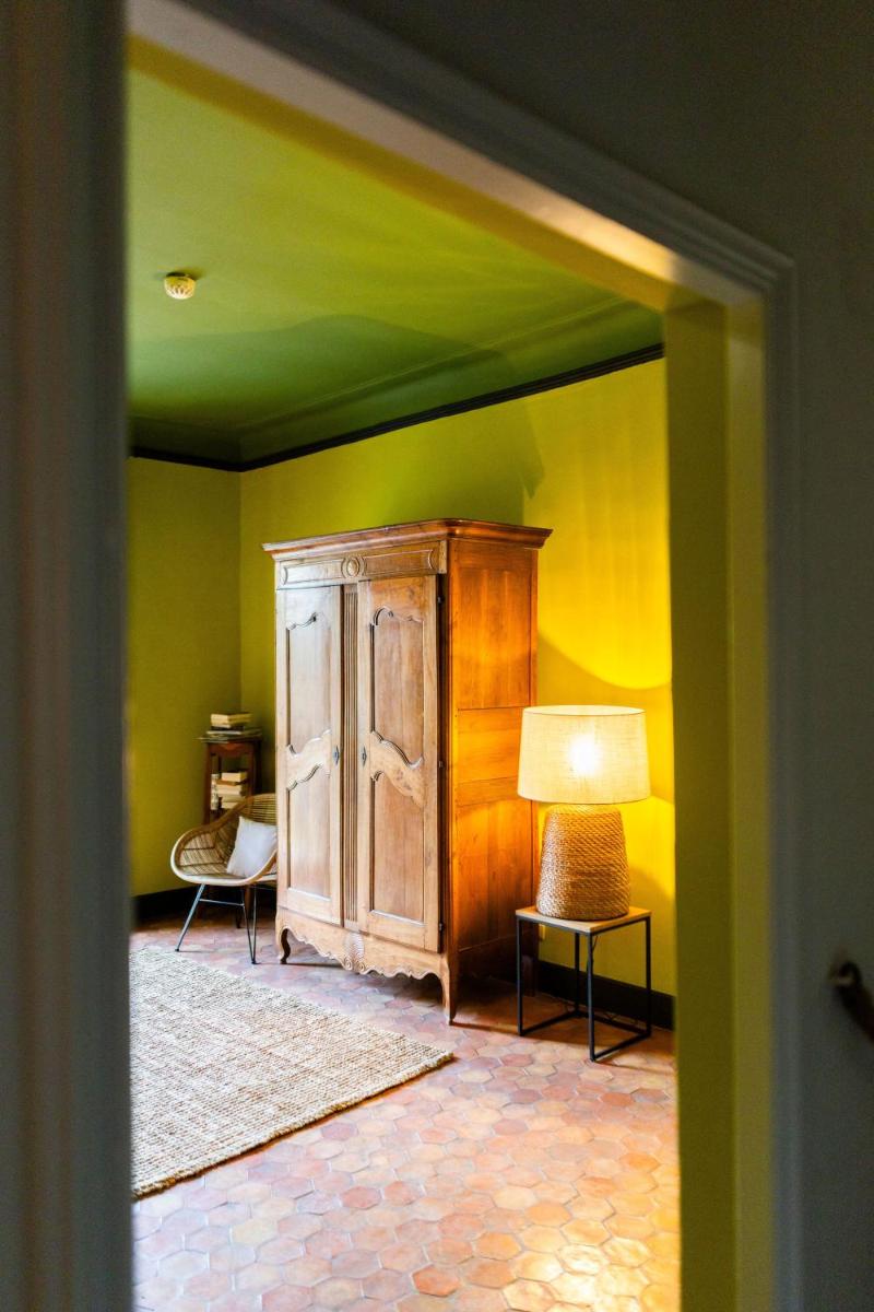 Un ou plusieurs lits dans un hébergement de l'établissement Hôtel - Restaurant & Spa La Magdeleine - Mathias Dandine