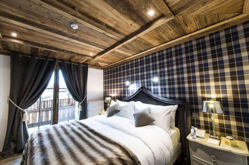Un ou plusieurs lits dans un hébergement de l'établissement Le Chalet Blanc