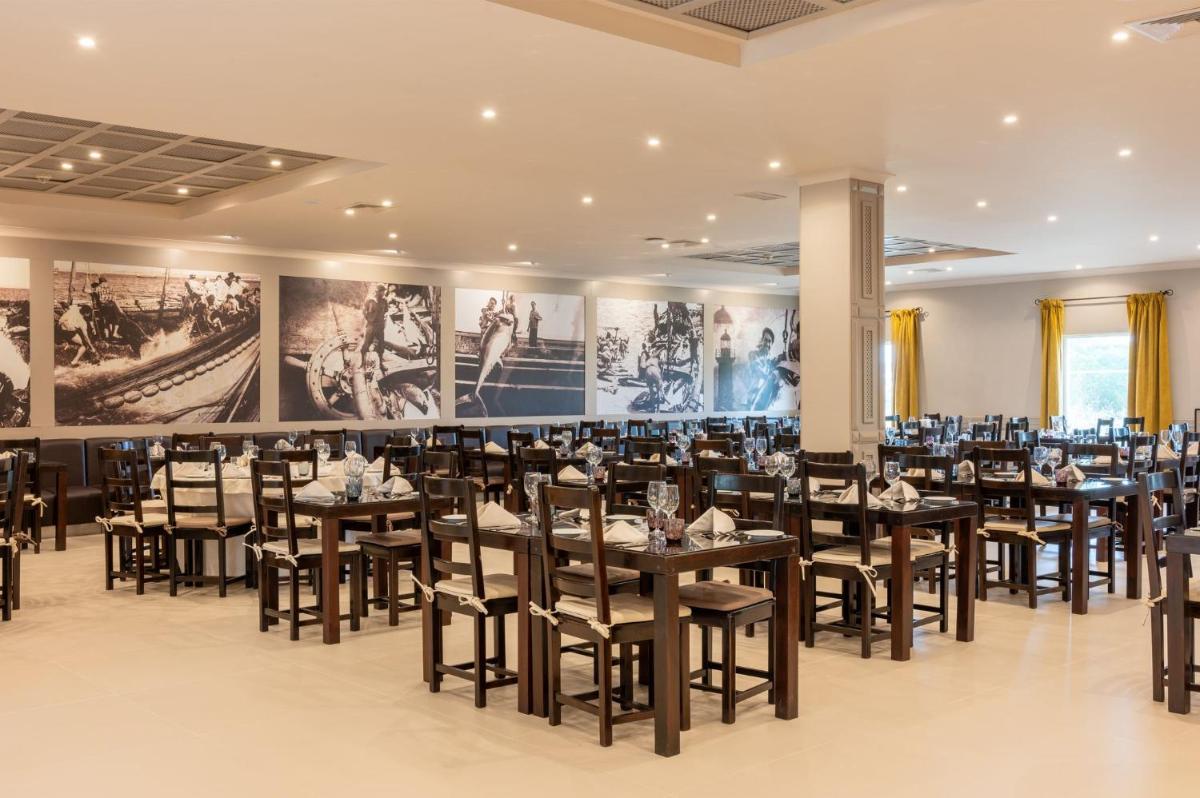 Um restaurante ou outro lugar para comer em Vila Gale Albacora