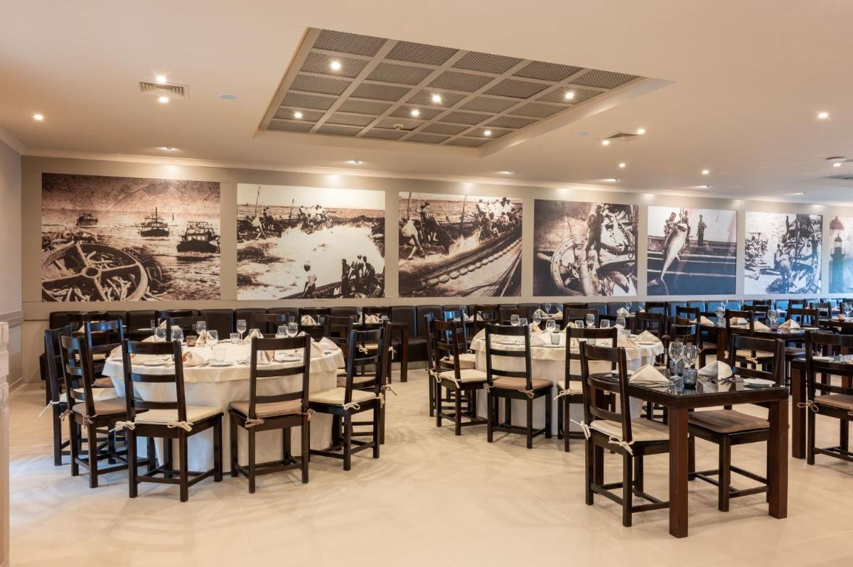 Um restaurante ou outro lugar para comer em Vila Gale Albacora