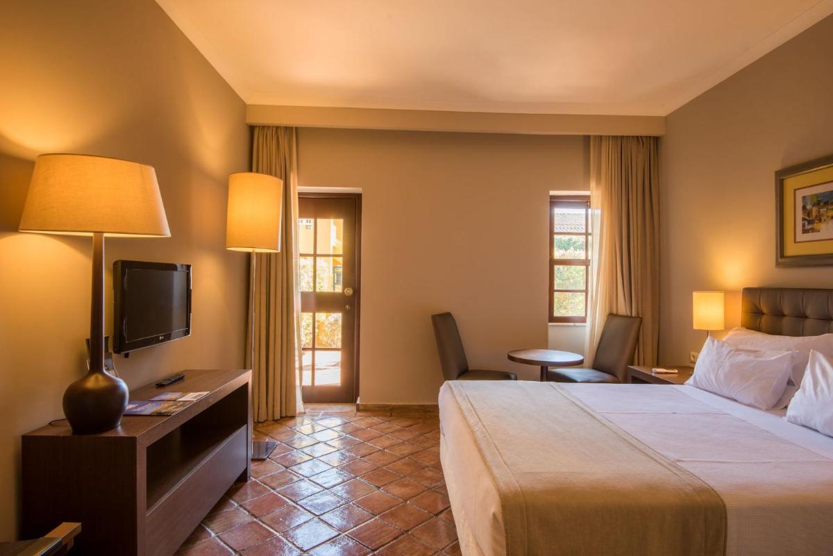 Uma cama ou camas num quarto em Vila Gale Albacora