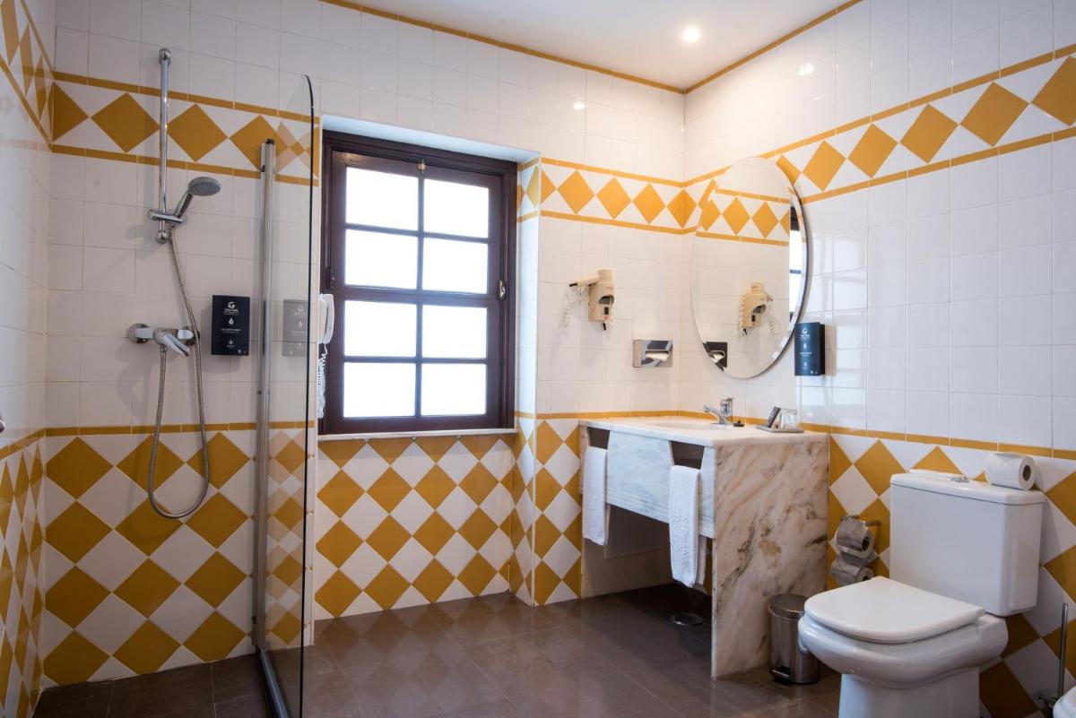 Uma casa de banho em Vila Gale Albacora