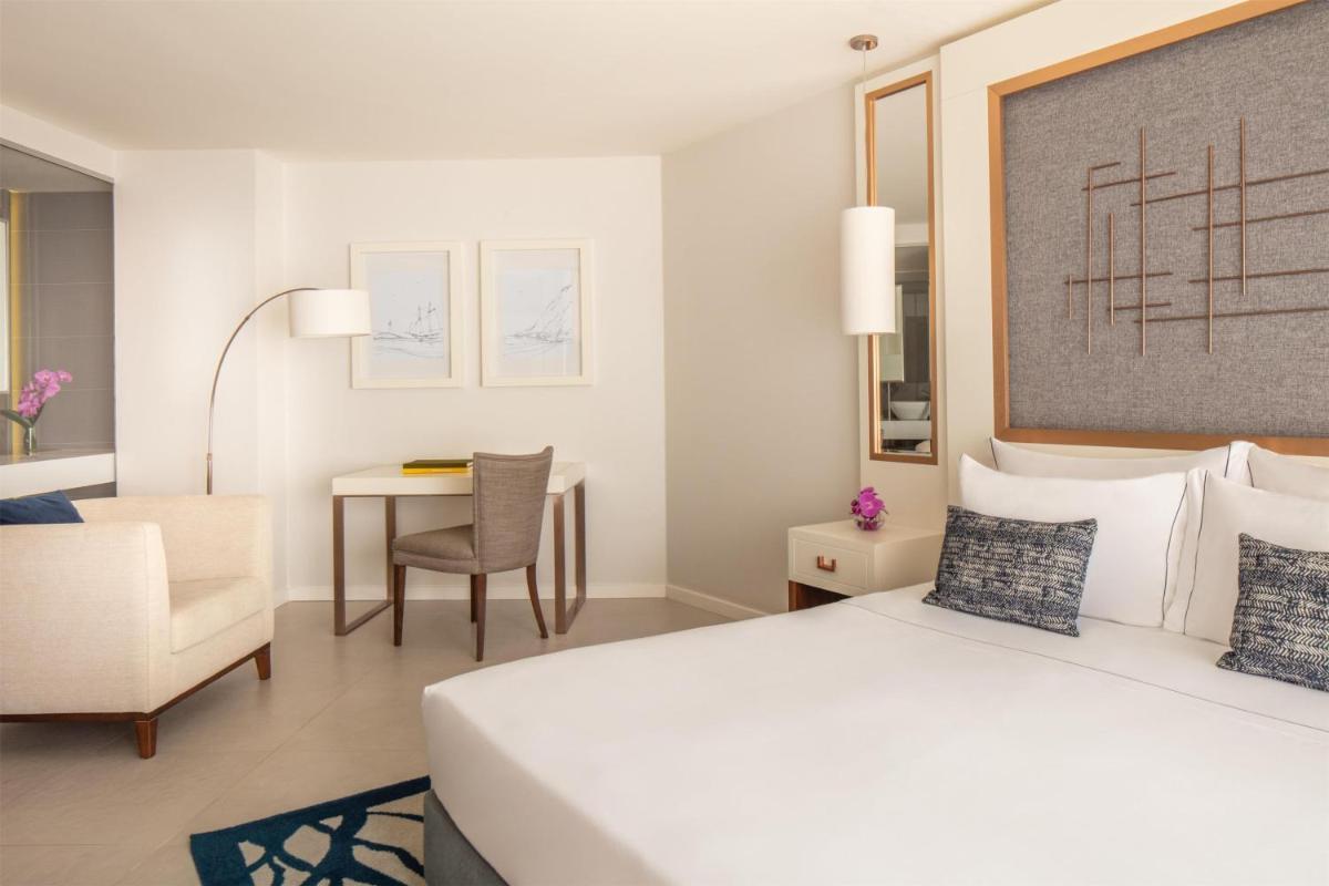 Uma cama ou camas num quarto em Tivoli Carvoeiro