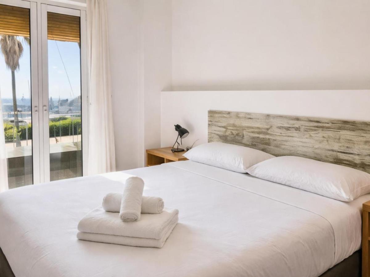 Apartamentos Port Marina - Housity