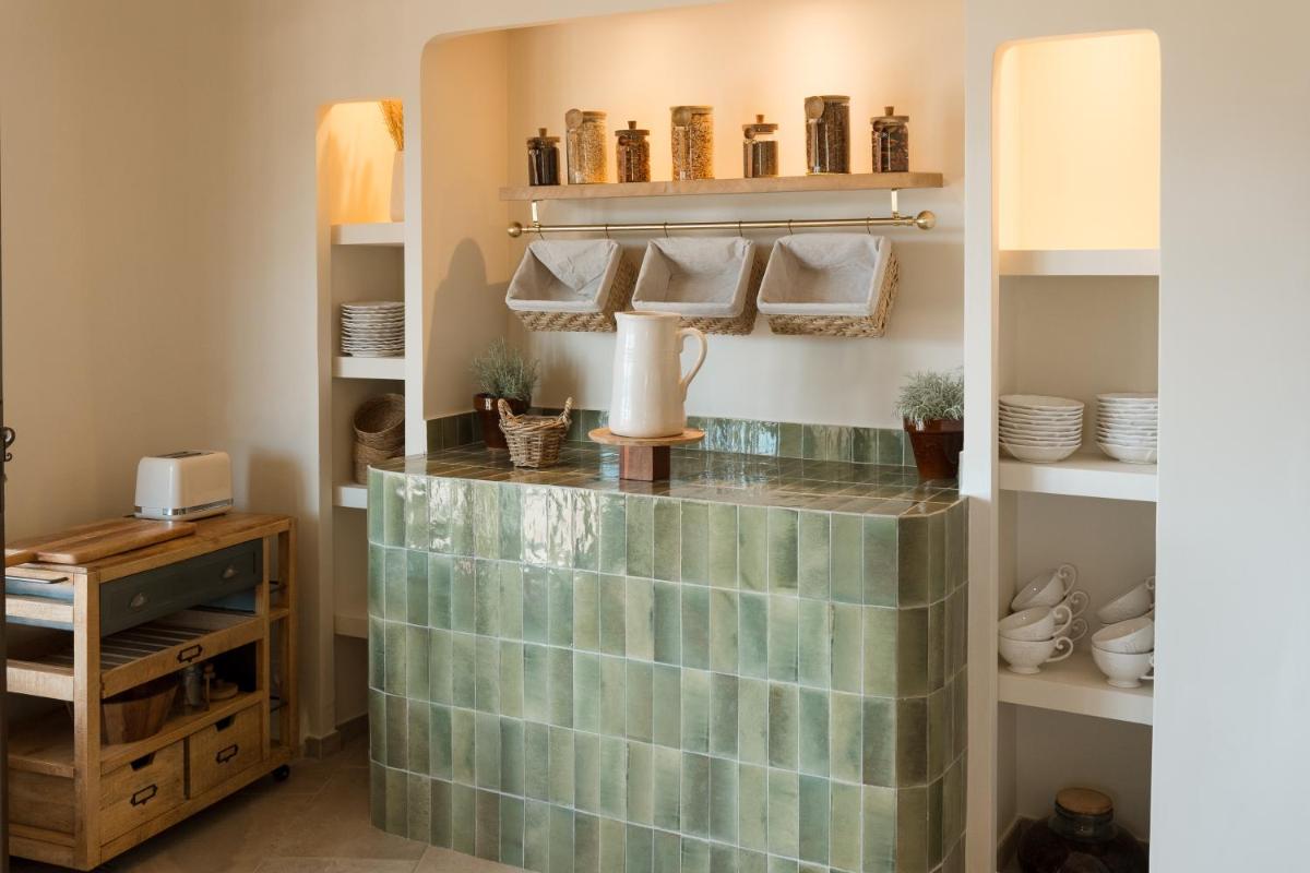 Cuisine ou kitchenette dans l'établissement L'Hostellerie du Moulin des Oliviers