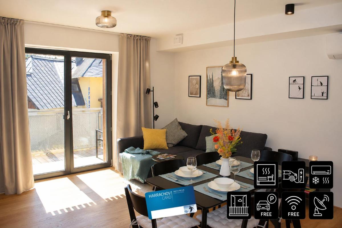 ENJOYHARRACHOV - Atraktivní slunný klimatizovaný apartmán 14 v centru Harrachova se saunou, parkováním, Wifi-WLAN, SAT, herní konzolí, PC s win 10, Netflix zdarma a možností dobíjení auta s jedinečným výhledem na Čertovu horu se skokanskými můstky - Housity