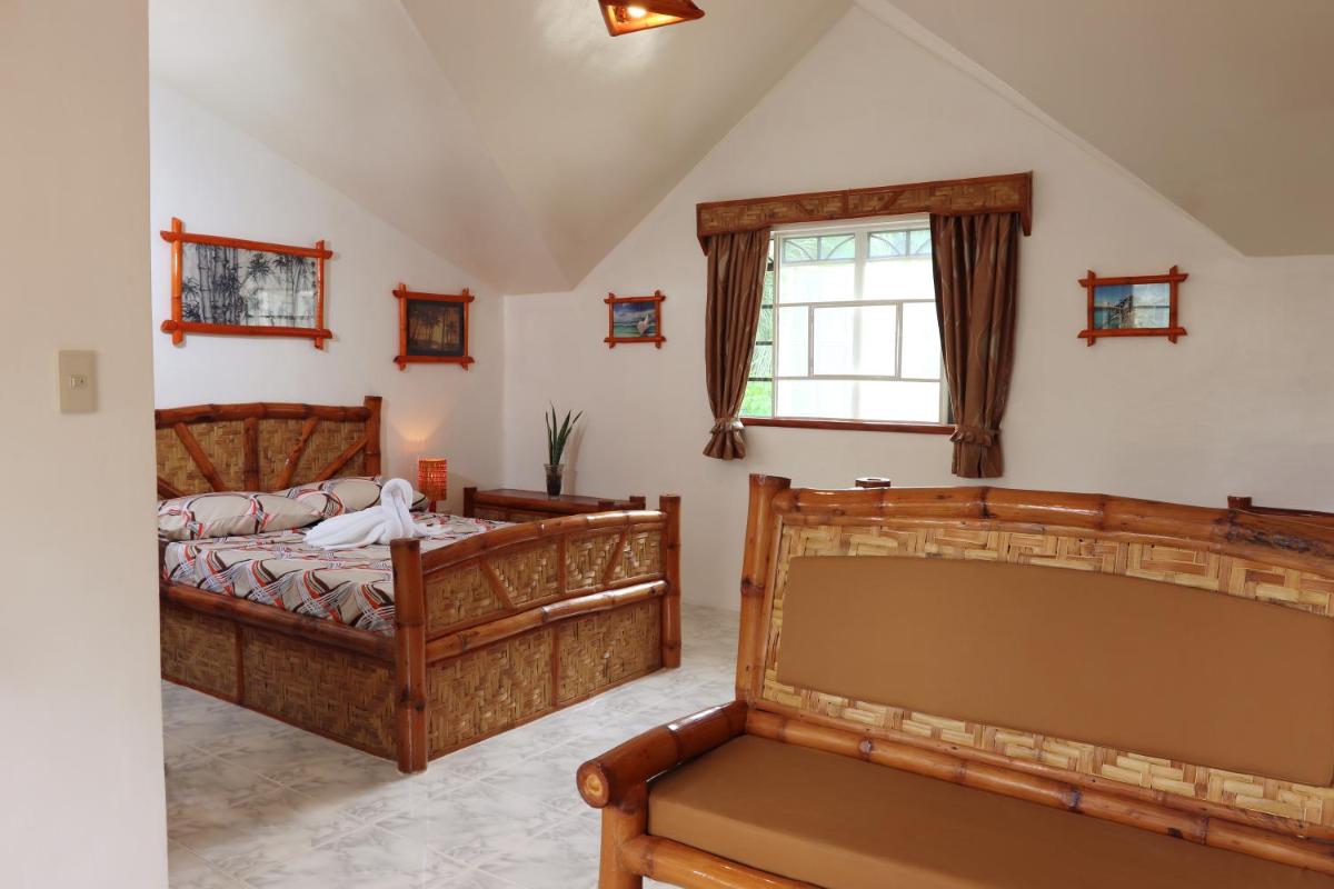 Guindulman Bay Tourist Inn - Housity