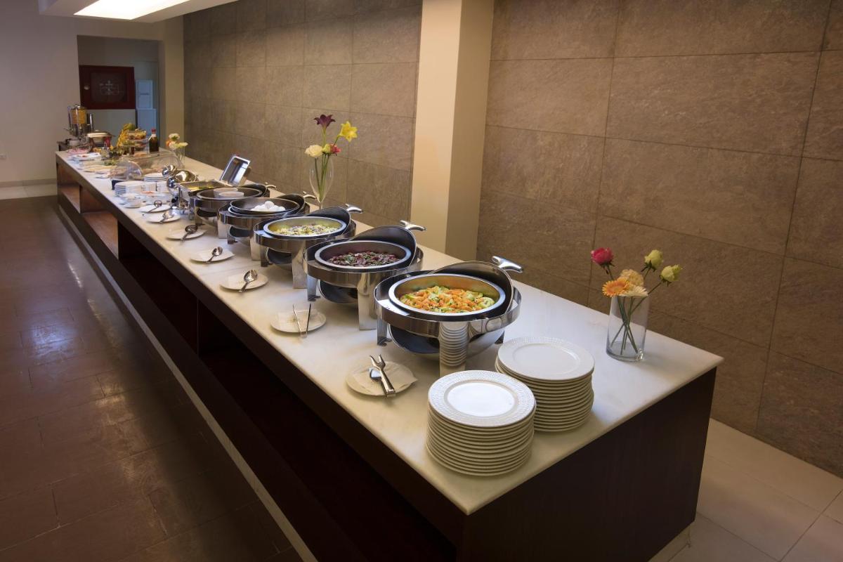 Grand Lily Hotel Suites - Housity