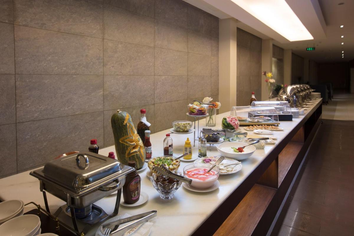 Grand Lily Hotel Suites - Housity