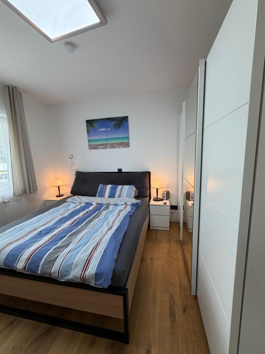 Modern 2-Room Apartment in Hockenheim with Free Parking, Wi-Fi & Reinigung Service - Housity