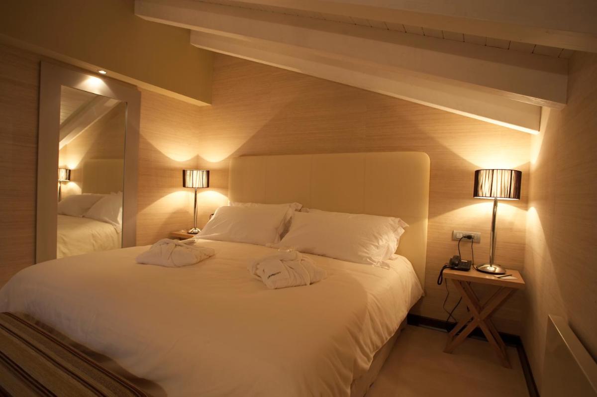 Cama o camas de una habitación en Hotel La Trufa Negra