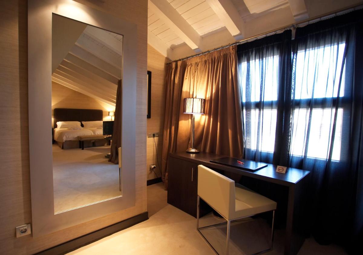 Cama o camas de una habitación en Hotel La Trufa Negra
