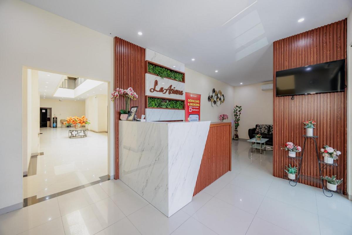 RedDoorz Plus @ La Asiana Guest House - Housity
