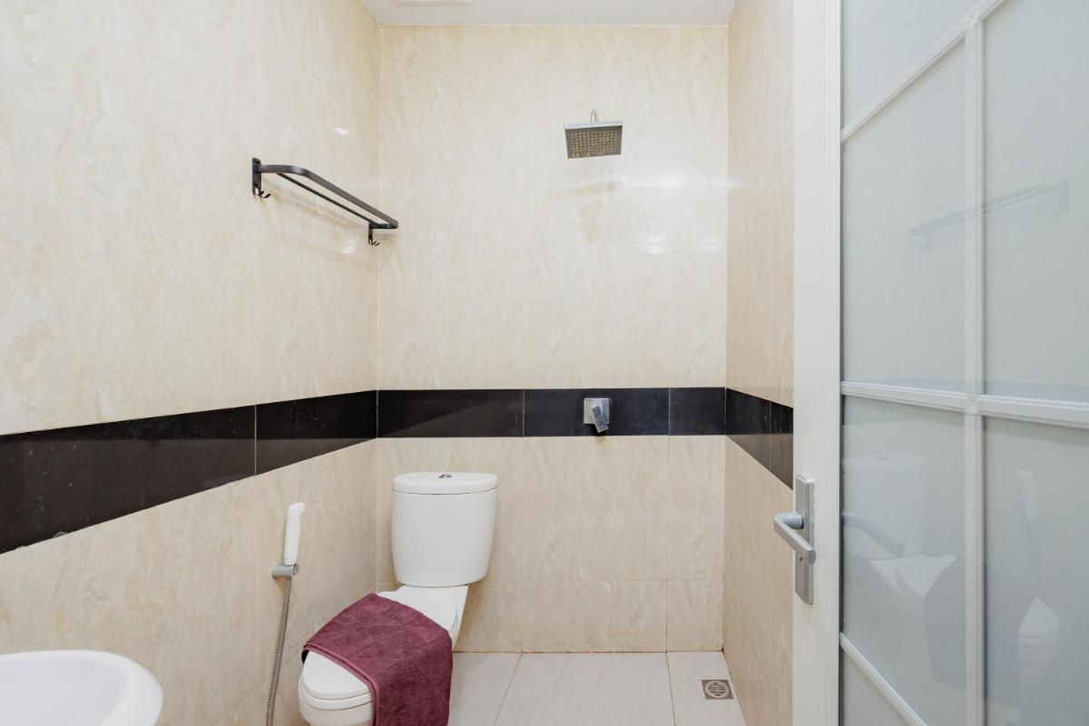 RedDoorz Plus @ La Asiana Guest House - Housity