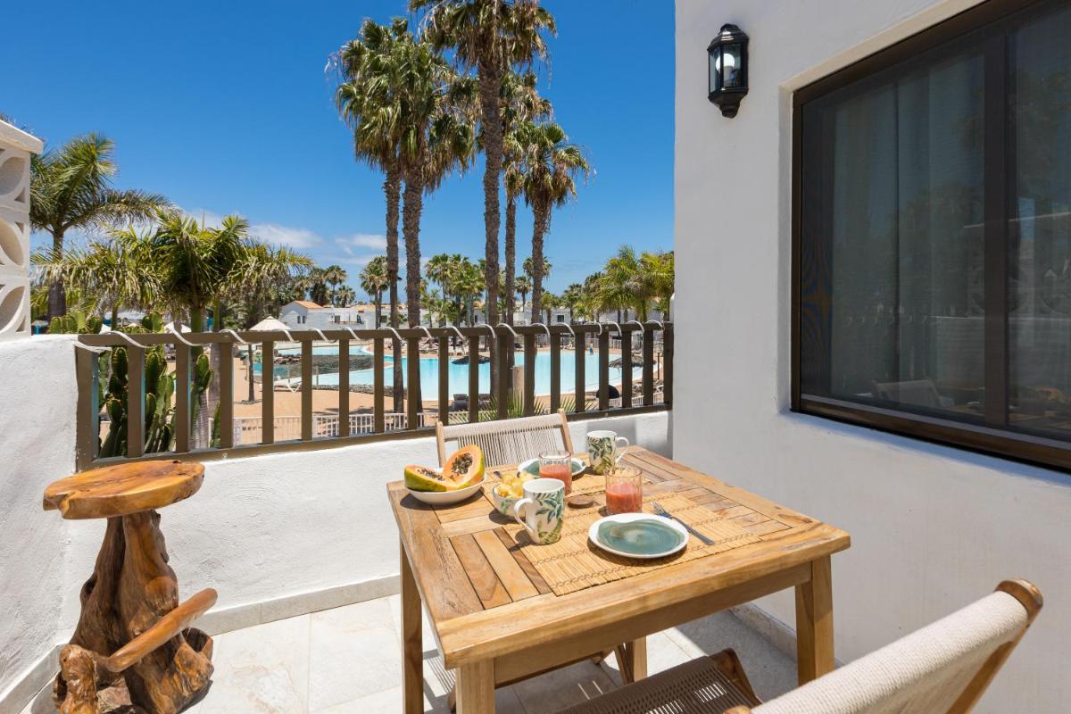 Corralejo Oasis Duna Casa 3P is Premium Adults-Only Apartment with Panoramic Pool View - Housity